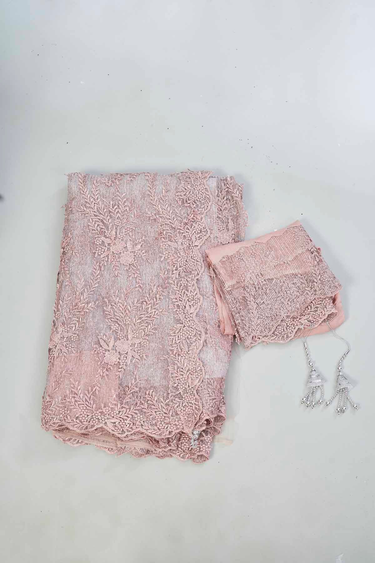 Shop dusty pink embroidered designer net sari online in USA. Look your best on festive occasions in latest designer saris, pure silk saris, Kanjivaram silk sarees, handwoven saris, silk sarees, linen sarees,  embroidered sarees from Pure Elegance Indian clothing store in USA.-blouse