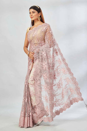 Shop dusty pink embroidered designer net sari online in USA. Look your best on festive occasions in latest designer saris, pure silk saris, Kanjivaram silk sarees, handwoven saris, silk sarees, linen sarees,  embroidered sarees from Pure Elegance Indian clothing store in USA.-pallu