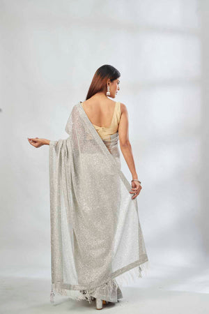 Buy light grey embroidered sequin net sari online in USA. Look your best on festive occasions in latest designer saris, pure silk saris, Kanjivaram silk sarees, handwoven saris, silk sarees, linen sarees,  embroidered sarees from Pure Elegance Indian clothing store in USA.-back