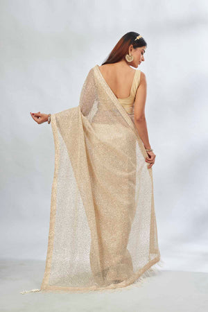 Shop stunning beige embroidered sequin net sari online in USA. Look your best on festive occasions in latest designer saris, pure silk saris, Kanjivaram silk sarees, handwoven saris, silk sarees, linen sarees,  embroidered sarees from Pure Elegance Indian clothing store in USA.-back