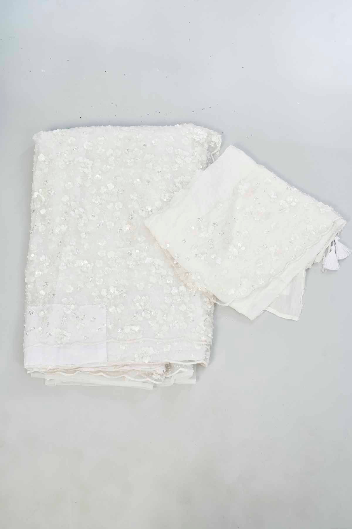 Buy beautiful white embroidered net designer sari online in USA. Look your best on festive occasions in latest designer saris, pure silk saris, Kanjivaram silk sarees, handwoven saris, silk sarees, linen sarees,  embroidered sarees from Pure Elegance Indian clothing store in USA.-blouse
