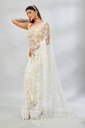 Buy beautiful white embroidered net designer sari online in USA. Look your best on festive occasions in latest designer saris, pure silk saris, Kanjivaram silk sarees, handwoven saris, silk sarees, linen sarees,  embroidered sarees from Pure Elegance Indian clothing store in USA.-pallu