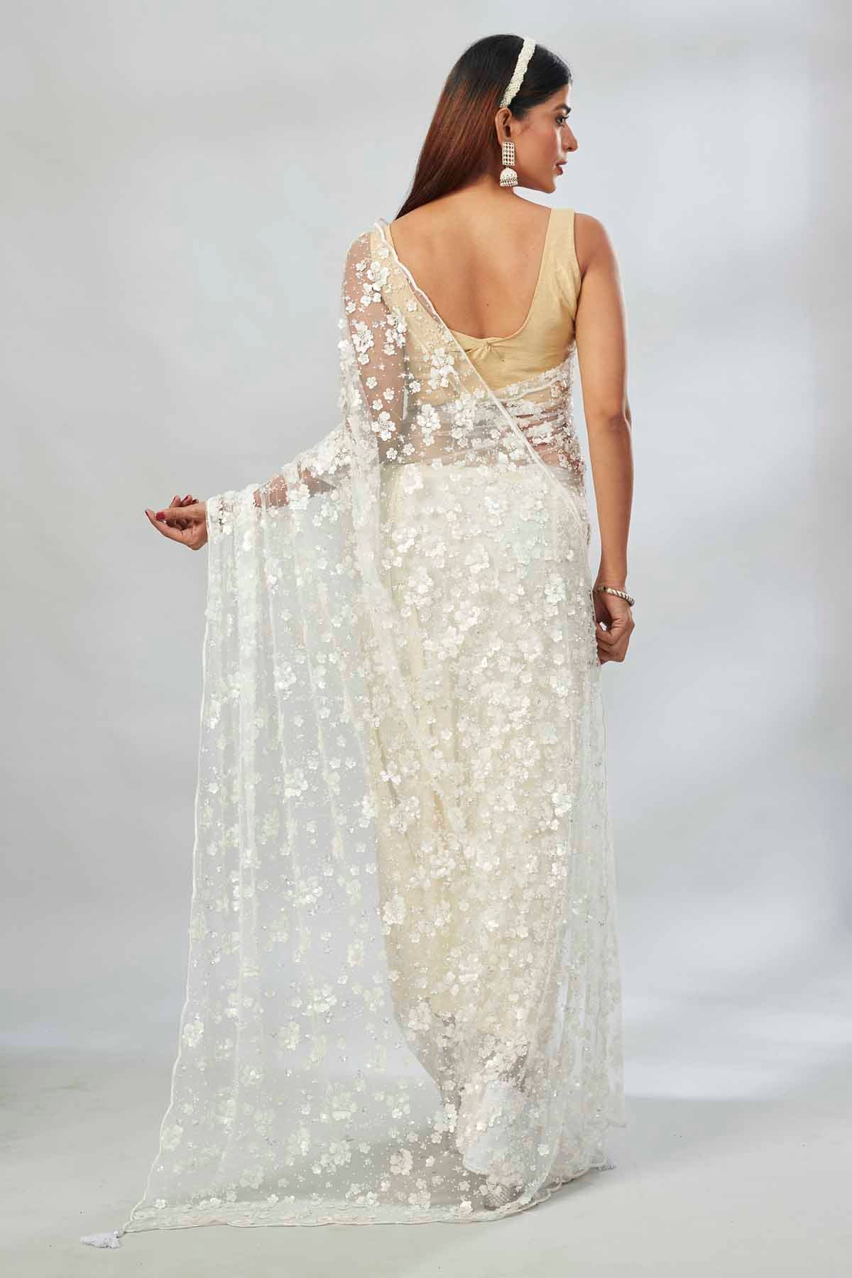 Buy beautiful white embroidered net designer sari online in USA. Look your best on festive occasions in latest designer saris, pure silk saris, Kanjivaram silk sarees, handwoven saris, silk sarees, linen sarees,  embroidered sarees from Pure Elegance Indian clothing store in USA.-back