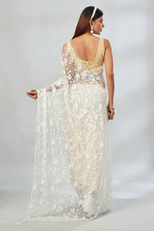 Buy beautiful white embroidered net designer sari online in USA. Look your best on festive occasions in latest designer saris, pure silk saris, Kanjivaram silk sarees, handwoven saris, silk sarees, linen sarees,  embroidered sarees from Pure Elegance Indian clothing store in USA.-back