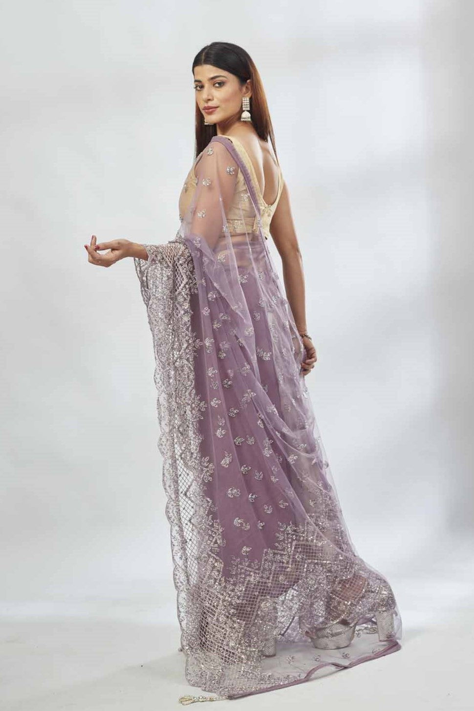 Buy mauve embroidered net designer sari online in USA. Look your best on festive occasions in latest designer saris, pure silk saris, Kanjivaram silk sarees, handwoven saris, tussar silk sarees, linen sarees,  embroidered sarees from Pure Elegance Indian clothing store in USA.-back