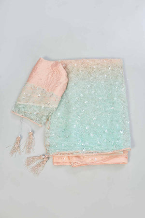 Buy cream and powder blue embroidered designer net sari online in USA. Look your best on festive occasions in latest designer saris, pure silk saris, Kanjivaram silk sarees, handwoven saris, tussar silk sarees, linen sarees,  embroidered sarees from Pure Elegance Indian clothing store in USA.-blouse