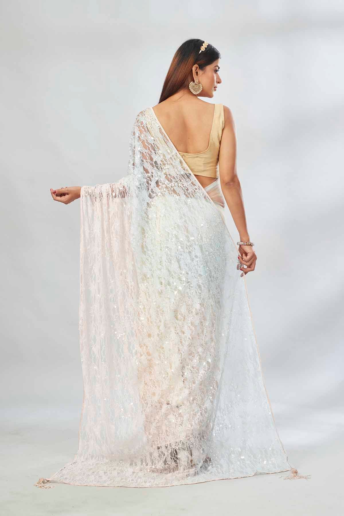 Buy cream and powder blue embroidered designer net sari online in USA. Look your best on festive occasions in latest designer saris, pure silk saris, Kanjivaram silk sarees, handwoven saris, tussar silk sarees, linen sarees,  embroidered sarees from Pure Elegance Indian clothing store in USA.-back