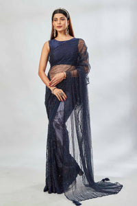Buy stunning navy designer net sari online in USA with overall embroidery. Look your best on festive occasions in latest designer saris, pure silk saris, Kanjivaram silk sarees, handwoven saris, tussar silk sarees, linen sarees,  embroidered sarees from Pure Elegance Indian clothing store in USA.-full view