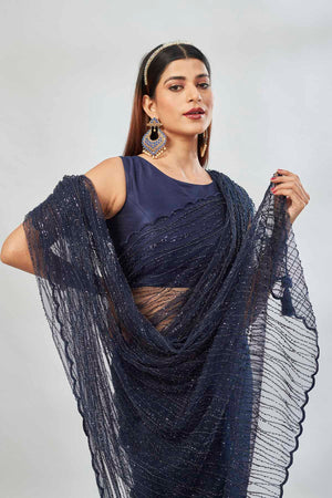 Buy stunning navy designer net sari online in USA with overall embroidery. Look your best on festive occasions in latest designer saris, pure silk saris, Kanjivaram silk sarees, handwoven saris, tussar silk sarees, linen sarees,  embroidered sarees from Pure Elegance Indian clothing store in USA.-closeup