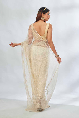 Buy cream designer net sari online in USA with overall embroidery. Look your best on festive occasions in latest designer saris, pure silk saris, Kanjivaram silk sarees, handwoven saris, tussar silk sarees, linen sarees,  embroidered sarees from Pure Elegance Indian clothing store in USA.-back