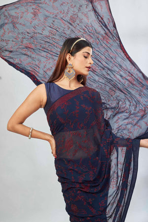 Shop navy blue embroidered georgette sari online in USA. Look your best on festive occasions in latest designer saris, pure silk saris, Kanjivaram silk sarees, handwoven saris, silk sarees, linen sarees,  embroidered sarees from Pure Elegance Indian clothing store in USA.-closeup