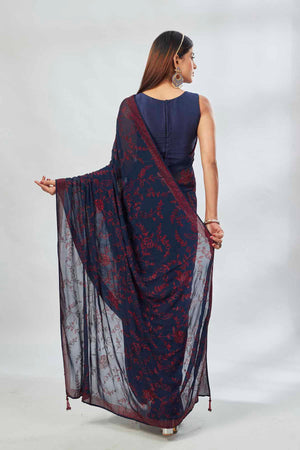 Shop navy blue embroidered georgette sari online in USA. Look your best on festive occasions in latest designer saris, pure silk saris, Kanjivaram silk sarees, handwoven saris, silk sarees, linen sarees,  embroidered sarees from Pure Elegance Indian clothing store in USA.- back