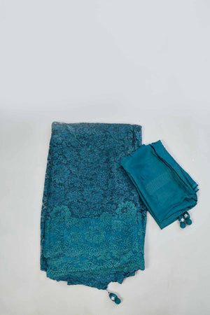 Shop stunning teal embroidered lace saree online in USA. Look your best on festive occasions in latest designer saris, pure silk saris, Kanjivaram silk sarees, handwoven saris, tussar silk sarees, linen sarees,  embroidered sarees from Pure Elegance Indian clothing store in USA.-blouse