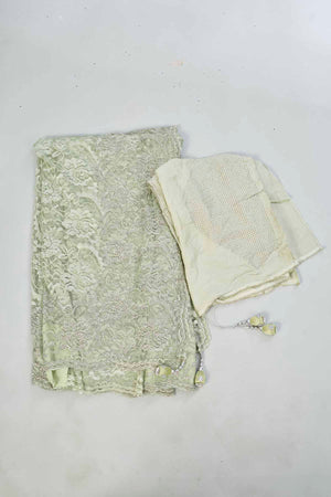 Buy elegant pastel  green embroidered lace saree online in USA. Look your best on festive occasions in latest designer saris, pure silk saris, Kanjivaram silk sarees, handwoven saris, tussar silk sarees, linen sarees,  embroidered sarees from Pure Elegance Indian clothing store in USA.-blouse