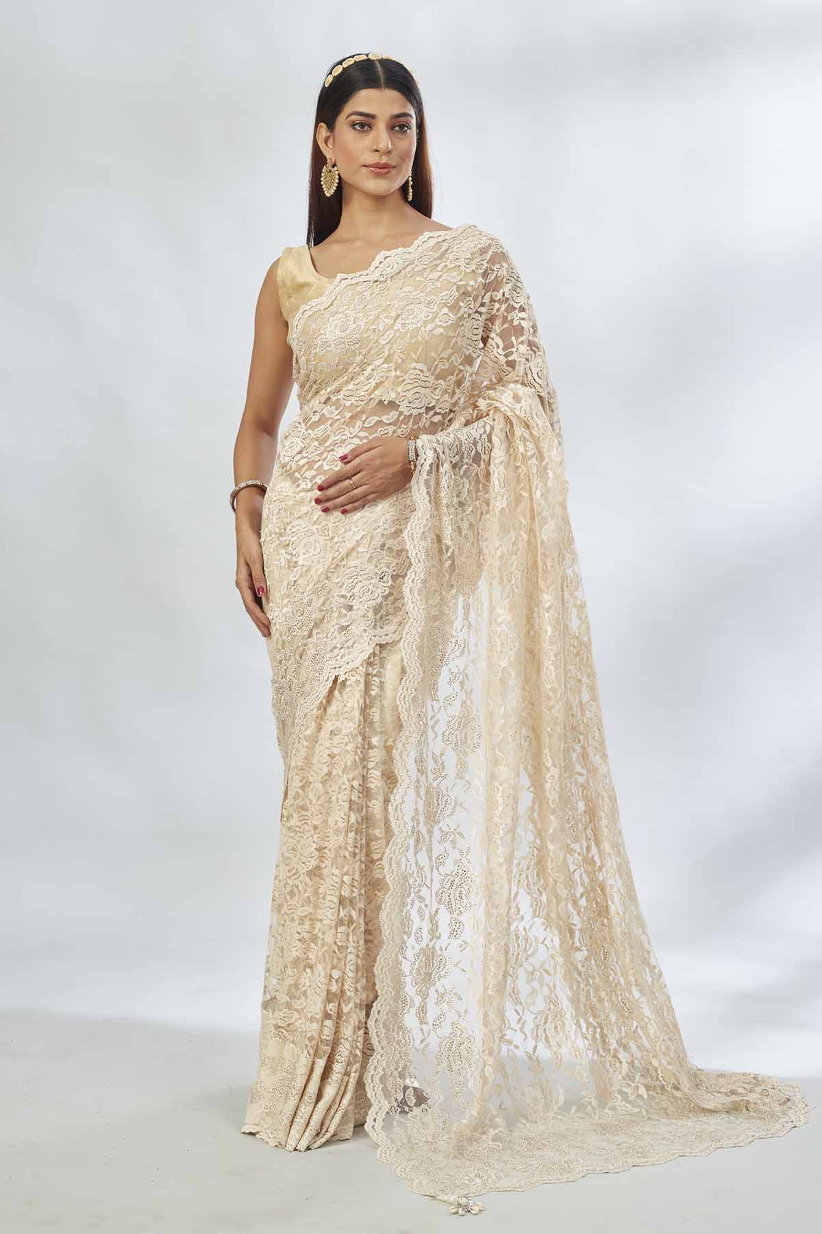 Shop elegant cream embroidered lace saree online in USA. Look your best on festive occasions in latest designer saris, pure silk saris, Kanjivaram silk sarees, handwoven saris, tussar silk sarees, linen sarees,  embroidered sarees from Pure Elegance Indian clothing store in USA.-full view