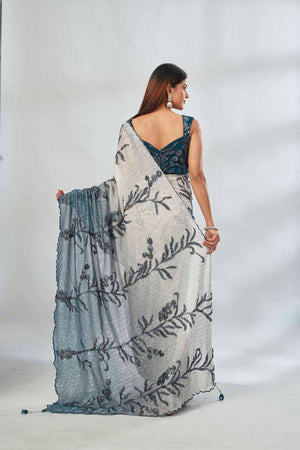 Shop green and cream sequin embroidered saree online in USA with blouse. Look your best on festive occasions in latest designer saris, pure silk saris, Kanjivaram silk sarees, handwoven saris, tussar silk sarees, linen sarees,  embroidered sarees from Pure Elegance Indian clothing store in USA.-back