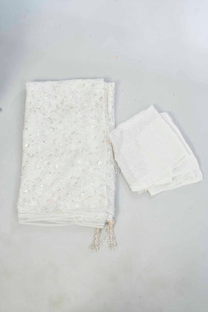 Buy white embroidered lace net designer saree online in USA with blouse. Look your best on festive occasions in latest designer saris, pure silk saris, Kanjivaram silk sarees, handwoven saris, tussar silk sarees, linen sarees,  embroidered sarees from Pure Elegance Indian clothing store in USA.-blouse