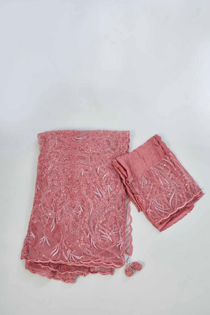Shop dusty pink embroidered lace net saree online in USA with blouse. Look your best on festive occasions in latest designer saris, pure silk saris, Kanjivaram silk sarees, handwoven saris, tussar silk sarees, linen sarees,  embroidered sarees from Pure Elegance Indian clothing store in USA.-blouse