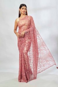 Shop dusty pink embroidered lace net saree online in USA with blouse. Look your best on festive occasions in latest designer saris, pure silk saris, Kanjivaram silk sarees, handwoven saris, tussar silk sarees, linen sarees,  embroidered sarees from Pure Elegance Indian clothing store in USA.-full view
