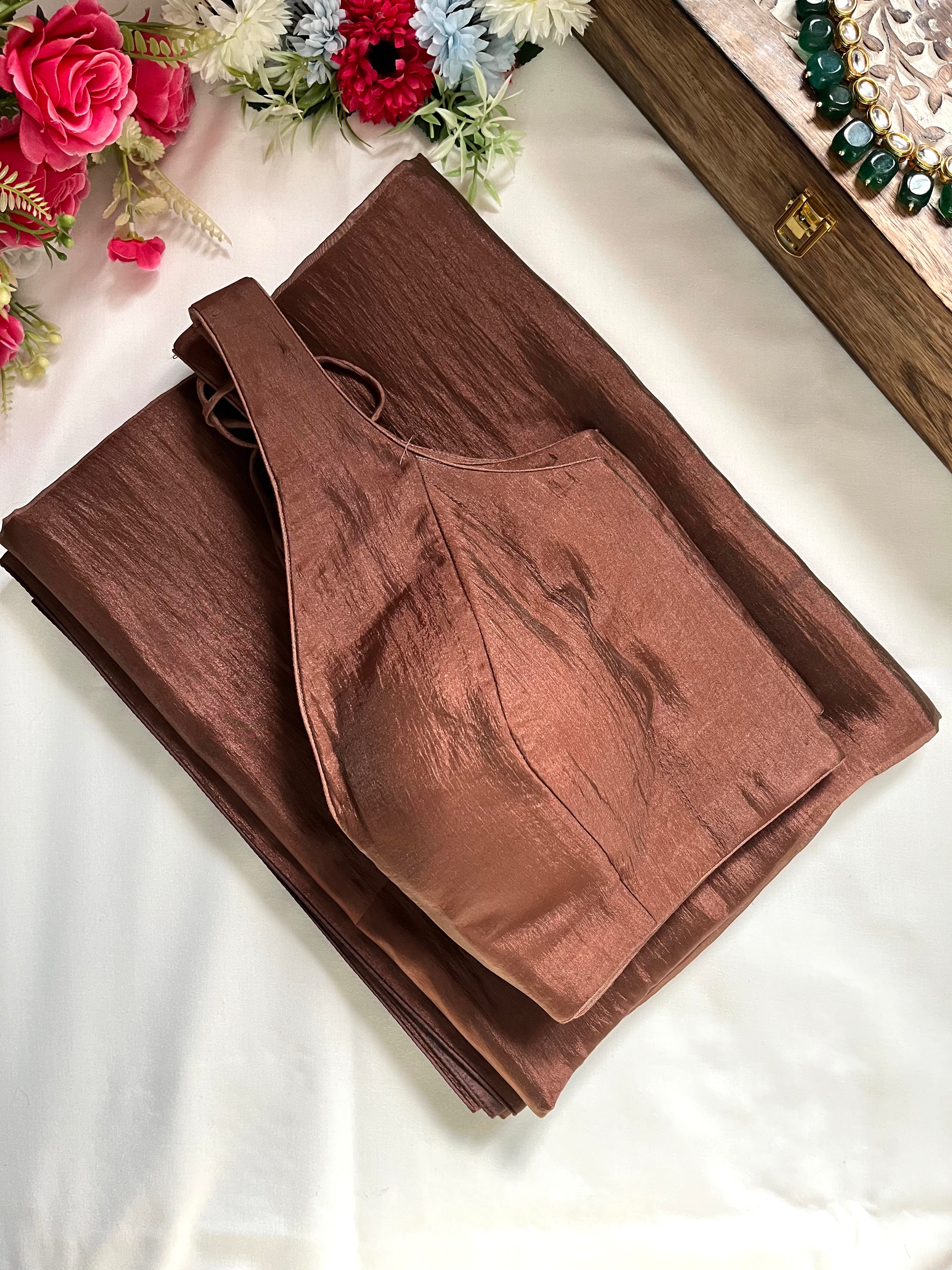 Shop solid brown tissue saree online in USA with sleeveless blouse. Look your best on festive occasions in latest designer saris, pure silk saris, Kanjivaram silk sarees, handwoven saris, tussar silk sarees, linen sarees,  summer sarees from Pure Elegance Indian clothing store in USA.-blouse