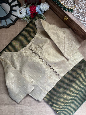 Buy green tissue zari saree online in USA with cream tissue blouse. Look your best on festive occasions in latest designer saris, pure silk saris, Kanjivaram silk sarees, handwoven saris, tussar silk sarees, linen sarees,  summer sarees from Pure Elegance Indian clothing store in USA.-back