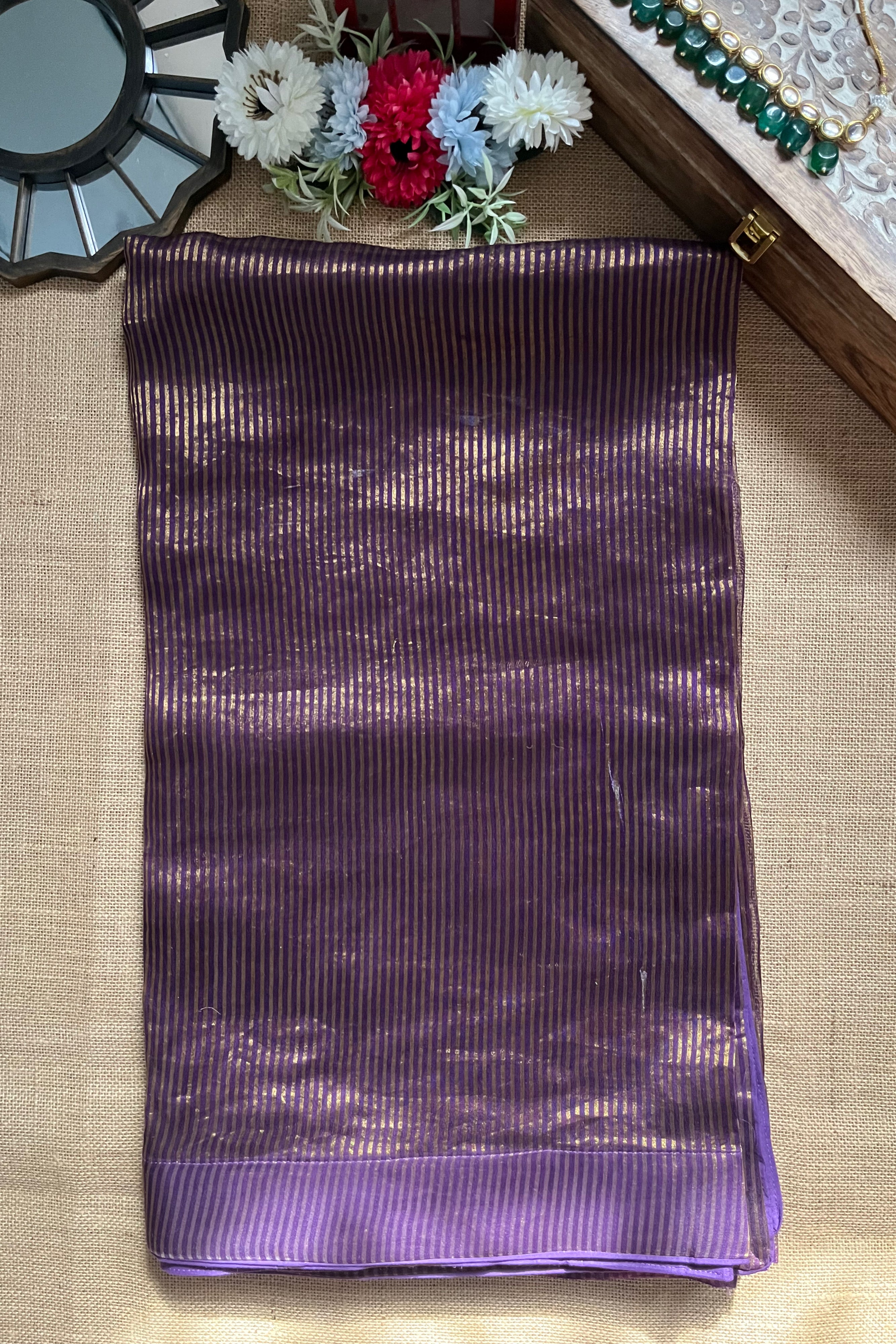 Shop purple tissue zari saree online in USA with cream designer blouse. Look your best on festive occasions in latest designer saris, pure silk saris, Kanjivaram silk sarees, handwoven saris, tussar silk sarees, linen sarees,  summer sarees from Pure Elegance Indian clothing store in USA.-saree