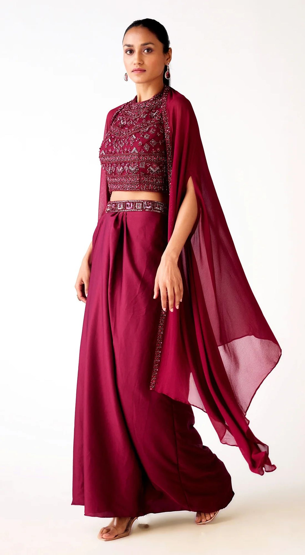 Buy wine satin embroidered draped skirt set online in USA with cape. Shop the best and latest designs in embroidered sarees, designer sarees, Anarkali suit, lehengas, sharara suits, kaftans for weddings and special occasions from Pure Elegance Indian fashion store in USA.-full view