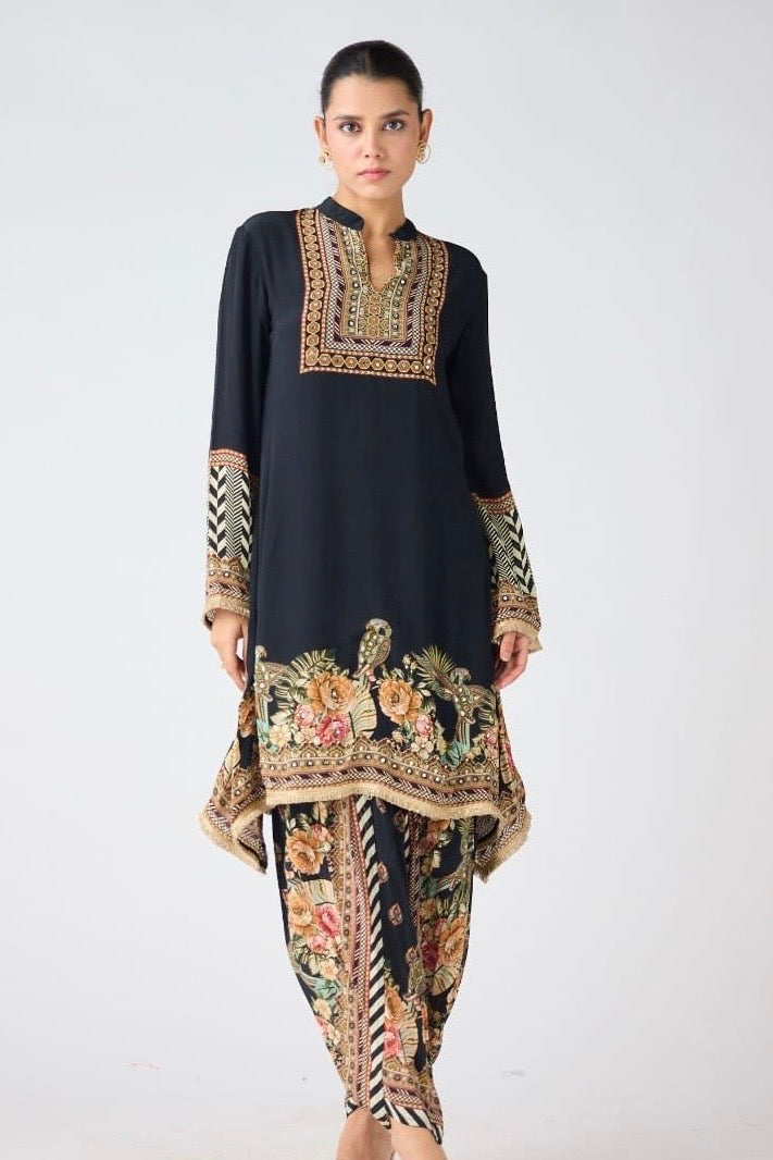 Shop black crepe printed kurta with dhoti salwar online in USA. Shop the best and latest designs in embroidered sarees, designer sarees, Anarkali suit, lehengas, sharara suits, kaftans for weddings and special occasions from Pure Elegance Indian fashion store in USA.-front