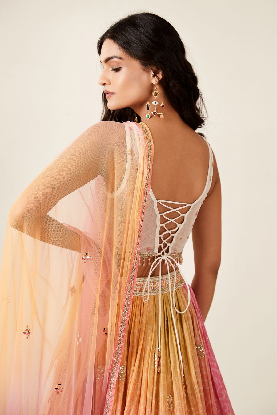 Buy pink tie and dye lehenga online in USA with dupatta. Shop designer lehengas, designer sarees, bridesmaids lehengas, designer salwar suits, wedding lehengas, wedding sarees in USA from Pure Elegance Indian fashion clothing store.-blouse back