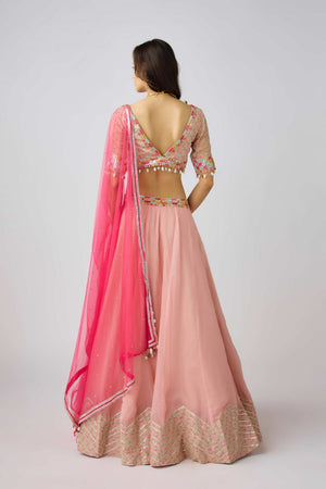 Buy light pink mirror and shell work lehenga online in USA with dupatta. Shop designer lehengas, designer sarees, bridesmaids lehengas, designer salwar suits, wedding lehengas, wedding sarees in USA from Pure Elegance Indian fashion clothing store.-back