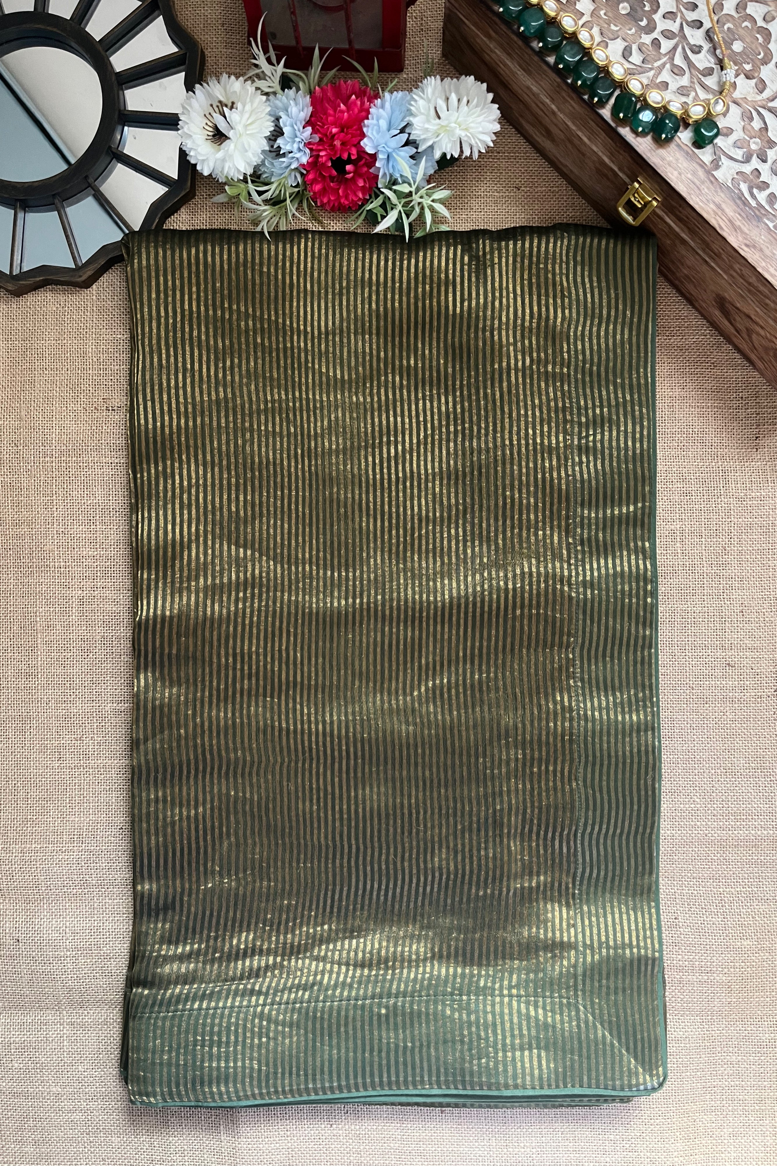 Buy green tissue zari saree online in USA with cream tissue blouse. Look your best on festive occasions in latest designer saris, pure silk saris, Kanjivaram silk sarees, handwoven saris, tussar silk sarees, linen sarees,  summer sarees from Pure Elegance Indian clothing store in USA.-saree