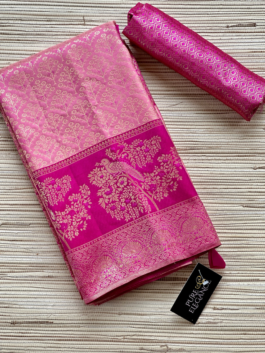 Shop pink Kanjivaram silk saree online in USA with dark pink zari border. Look your best on festive occasions in latest designer sarees, pure silk sarees, Kanjivaram silk saris, handwoven saris, tussar silk sarees, embroidered saris from Pure Elegance Indian clothing store in USA.-full view