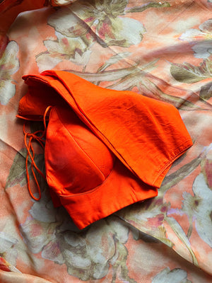 Shop beautiful orange floral shimmer georgette saree online in USA with blouse. Look your best on festive occasions in latest designer saris, pure silk saris, Kanjivaram silk sarees, handwoven saris, tussar silk sarees, linen sarees,  summer sarees from Pure Elegance Indian clothing store in USA.-blouse