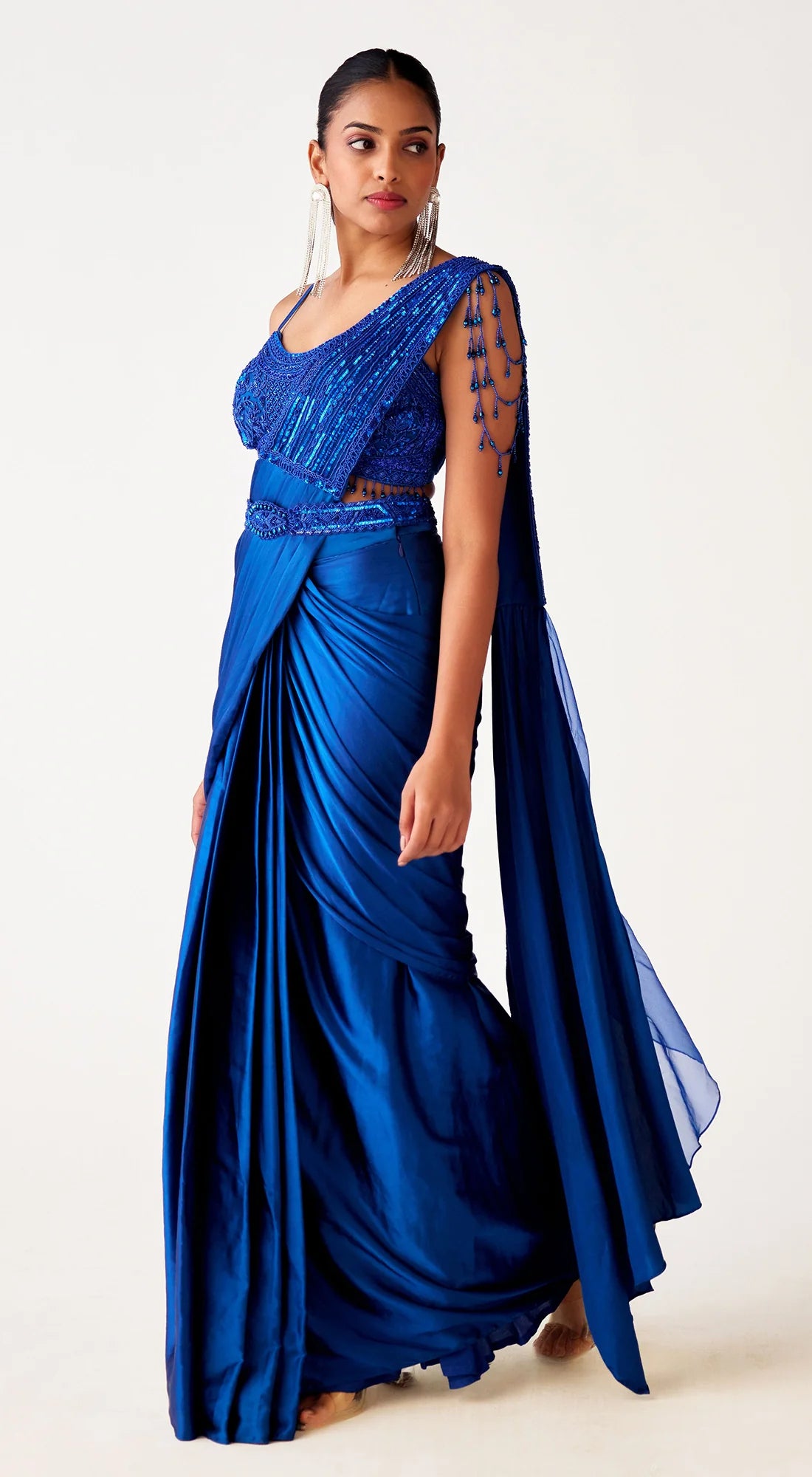 Shop blue embroidered crepe draped saree online in USA with blouse. Shop the best and latest designs in embroidered sarees, designer sarees, Anarkali suit, lehengas, sharara suits, kaftans for weddings and special occasions from Pure Elegance Indian fashion store in USA.-side