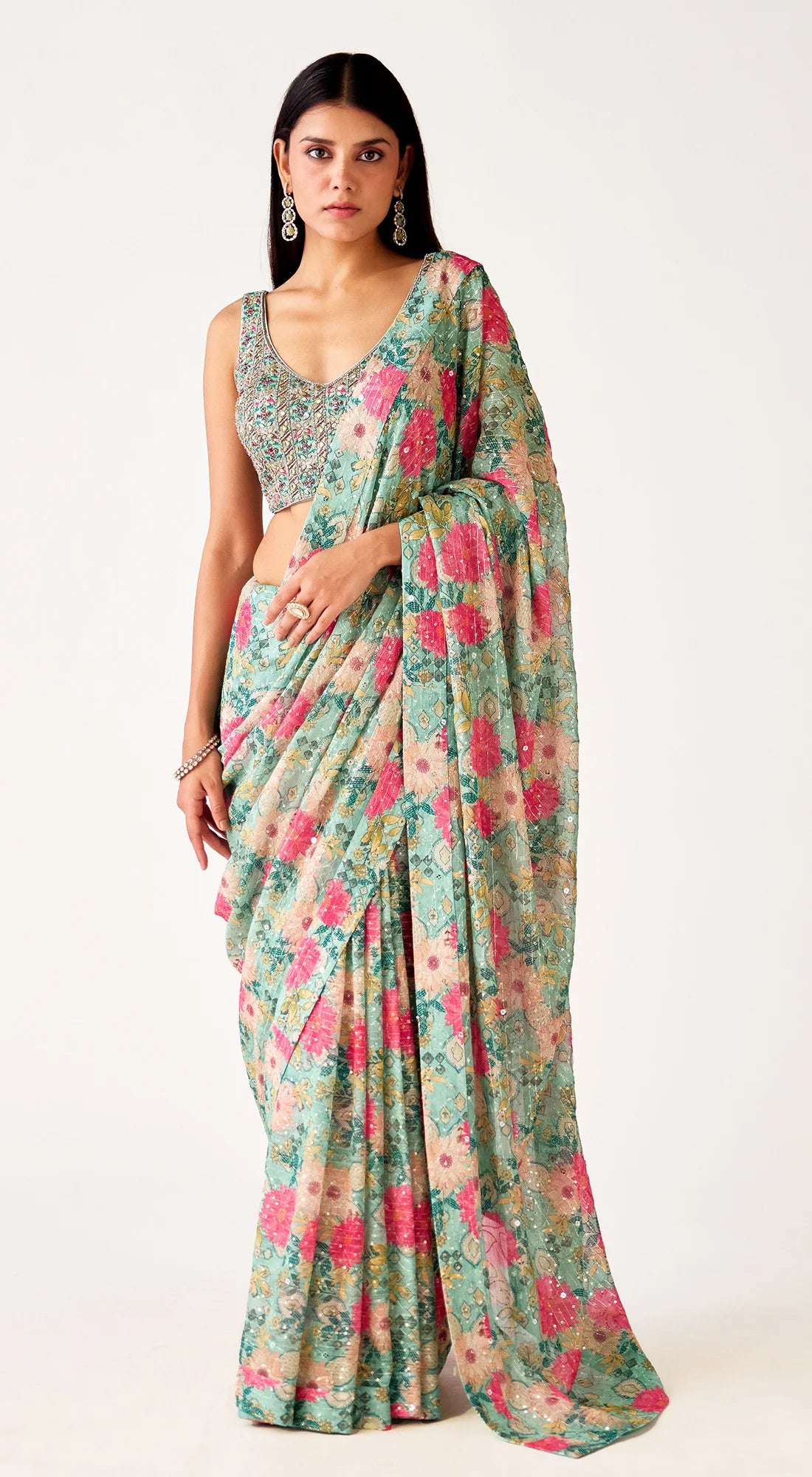 Shop green floral embroidered georgette saree online in USA with blouse. Shop the best and latest designs in embroidered sarees, designer sarees, Anarkali suit, lehengas, sharara suits, kaftans for weddings and special occasions from Pure Elegance Indian fashion store in USA.-full view