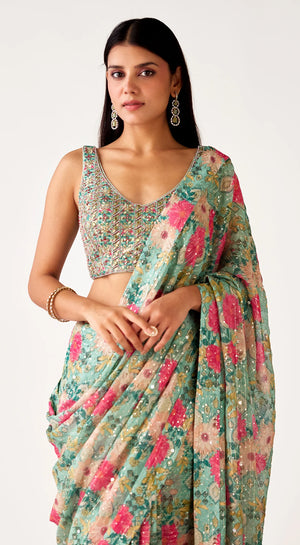 Shop green floral embroidered georgette saree online in USA with blouse. Shop the best and latest designs in embroidered sarees, designer sarees, Anarkali suit, lehengas, sharara suits, kaftans for weddings and special occasions from Pure Elegance Indian fashion store in USA.-closeup