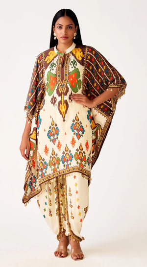 Buy cream printed embellished kaftan doti set online in USA. Shop the best and latest designs in embroidered sarees, designer sarees, Anarkali suit, lehengas, sharara suits, kaftans for weddings and special occasions from Pure Elegance Indian fashion store in USA.-front