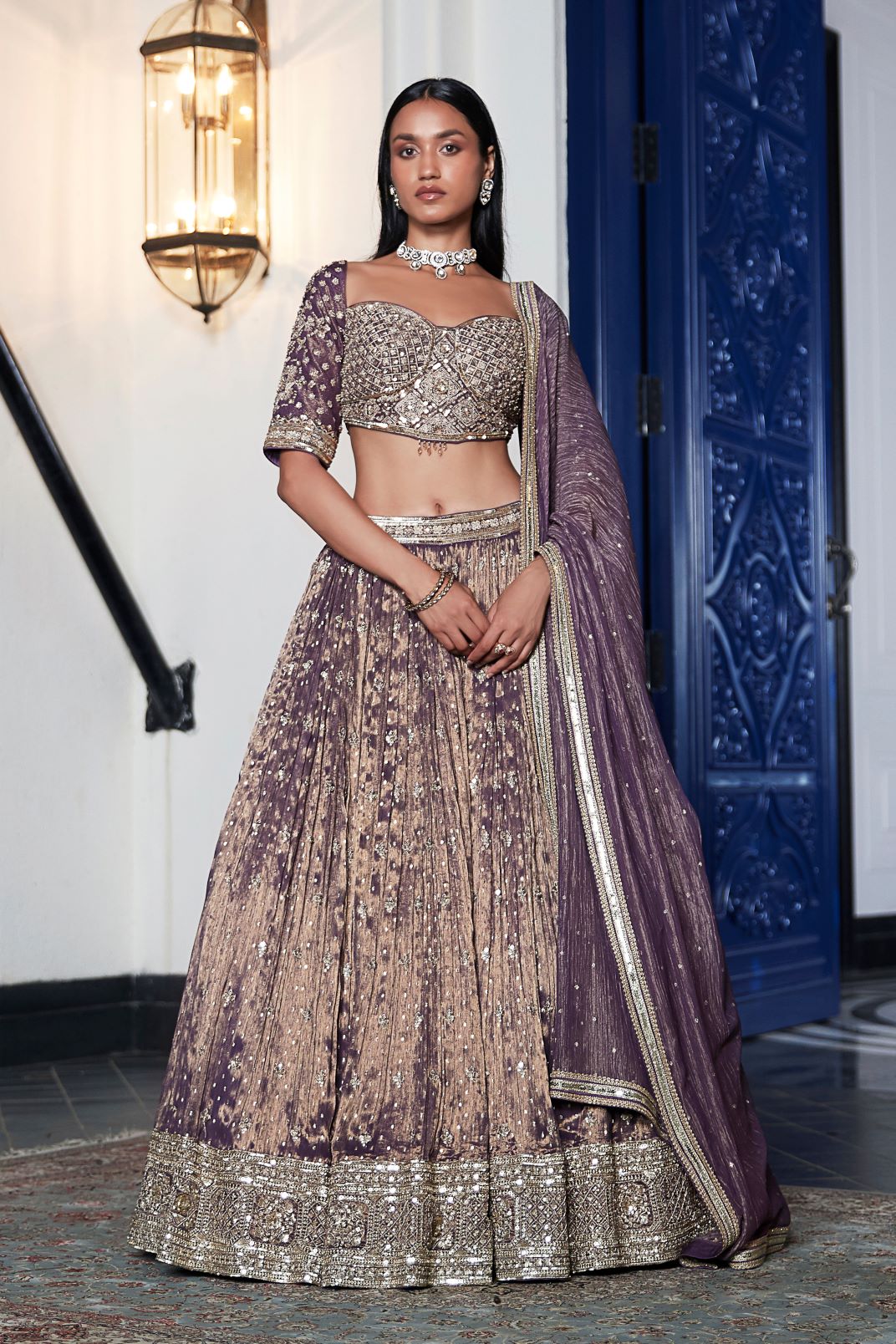 Shop purple hand embroidered tissue lehenga online in USA with dupatta. Shop designer lehengas, designer sarees, bridesmaids lehengas, designer salwar suits, wedding lehengas, wedding sarees in USA from Pure Elegance Indian fashion clothing store.-full view