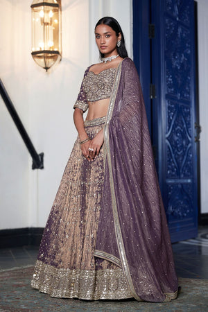 Shop purple hand embroidered tissue lehenga online in USA with dupatta. Shop designer lehengas, designer sarees, bridesmaids lehengas, designer salwar suits, wedding lehengas, wedding sarees in USA from Pure Elegance Indian fashion clothing store.-side