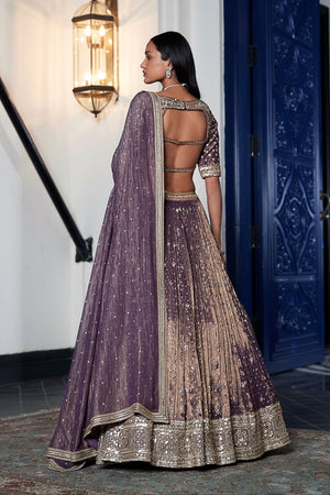 Shop purple hand embroidered tissue lehenga online in USA with dupatta. Shop designer lehengas, designer sarees, bridesmaids lehengas, designer salwar suits, wedding lehengas, wedding sarees in USA from Pure Elegance Indian fashion clothing store.-back
