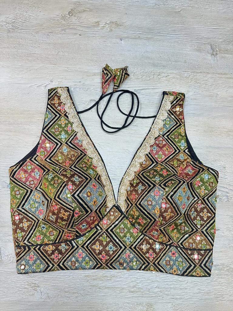 Buy navy multicolor sleeveless blouse with thread and mirror embroidery. Make a fashion statement on festive occasions and weddings with designer blouses, designer sarees, designer suits, Indian dresses, designer gowns, sharara suits, and embroidered sarees from Pure Elegance Indian fashion store in the USA.