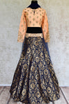 Buy online designer blue Banarasi skirt with peach embroidered blouse with dupatta .  Pure Elegance store brings Indian designer lehenga choli online in USA.-full view