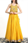 Buy sunshine yellow blended silk top with lehenga skirt online in USA. Get wedding ready with a stunning range of Indian designer lehengas from Pure Elegance fashion store in USA. Shop from a collection of silk saris, wedding sarees, and Indian clothing for a gorgeous ethnic look from our online store.-full view