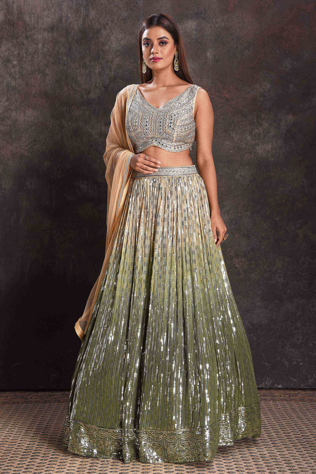 Shop beautiful ombre green designer sequin lehenga online in USA with dupatta. Look your ethnic best on festive occasions with latest designer sarees, pure silk sarees, Kanchipuram silk sarees, designer dresses, Anarkali suits, gown, embroidered sarees from Pure Elegance Indian fashion store in USA.-full view