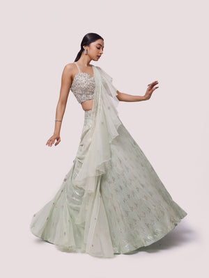 EMERALD GREEN LEHENGA SET WITH SILVER EMBROIDERY AND CUTOUT BLOUSE -  Seasons India
