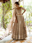 Shop stunning beige Lucknowi work lehenga online in USA with dupatta. Dazzle on weddings and special occasions with exquisite Indian designer dresses, sharara suits, Anarkali suits, wedding lehengas from Pure Elegance Indian fashion store in USA.-full view