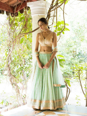 Ivory Sequence Lehenga With Green Mirrorwork Blouse - Anisha Shetty-  Fabilicious Fashion