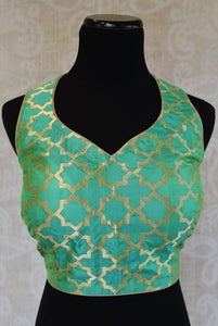 Shop this Indian ethnic Bollywood style designer green blouse from Pure Elegance store in Edison or buy it online. Perfect for any wedding party or reception. Green Blouse.