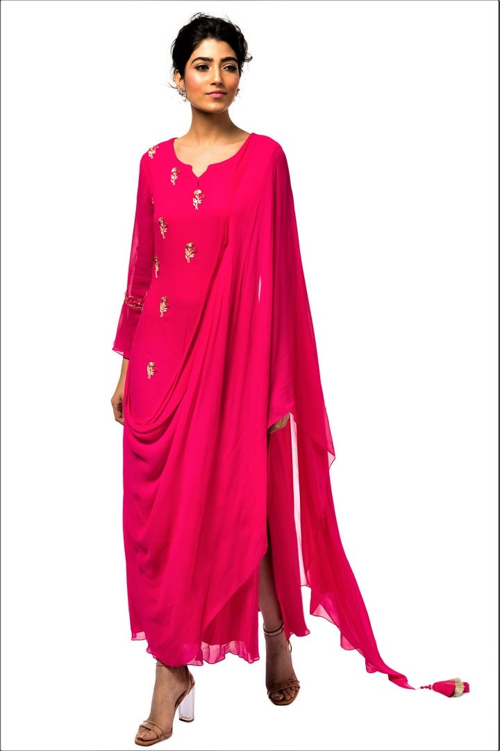 Buy hot pink embroidered georgette draped dress online in USA with churidaar. Make a dazzling style statement at parties, weddings and festive occasions with a range of exquisite designer dresses, designer gowns, wedding lehengas available at Pure Elegance Indian clothing store in USA or on our online store.-full view