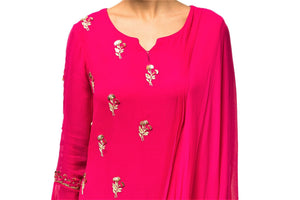 Buy hot pink embroidered georgette draped dress online in USA with churidaar. Make a dazzling style statement at parties, weddings and festive occasions with a range of exquisite designer dresses, designer gowns, wedding lehengas available at Pure Elegance Indian clothing store in USA or on our online store.-top